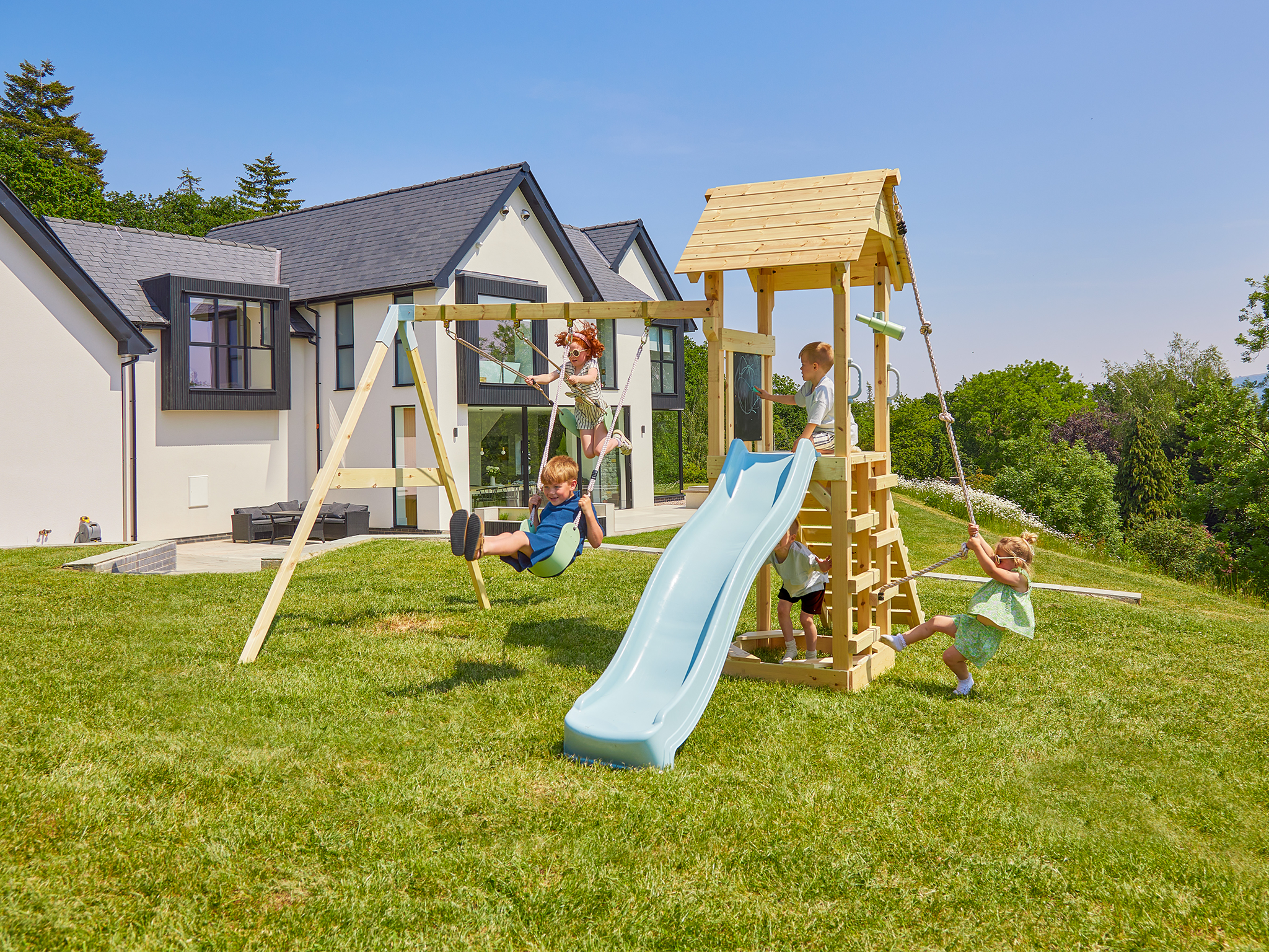 best climbing frames indybest review PolarPlay tower kids wooden climbing frame and double swing 