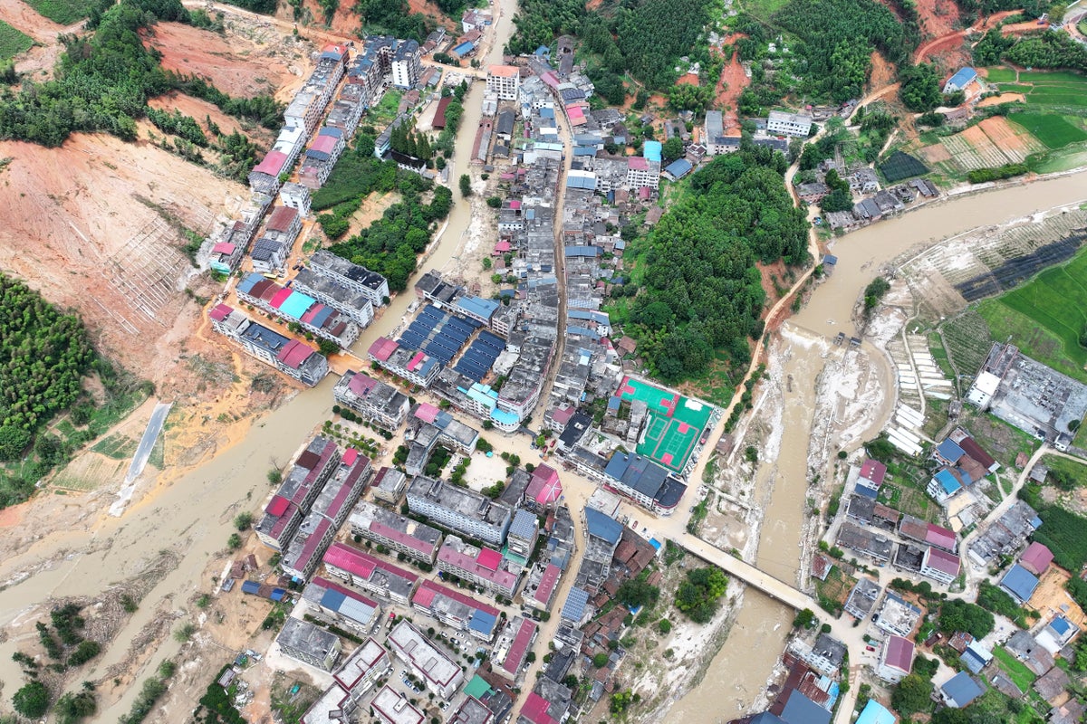 Death toll jumps to 30, with 35 others missing, in an area hit by heavy rains in southeastern China