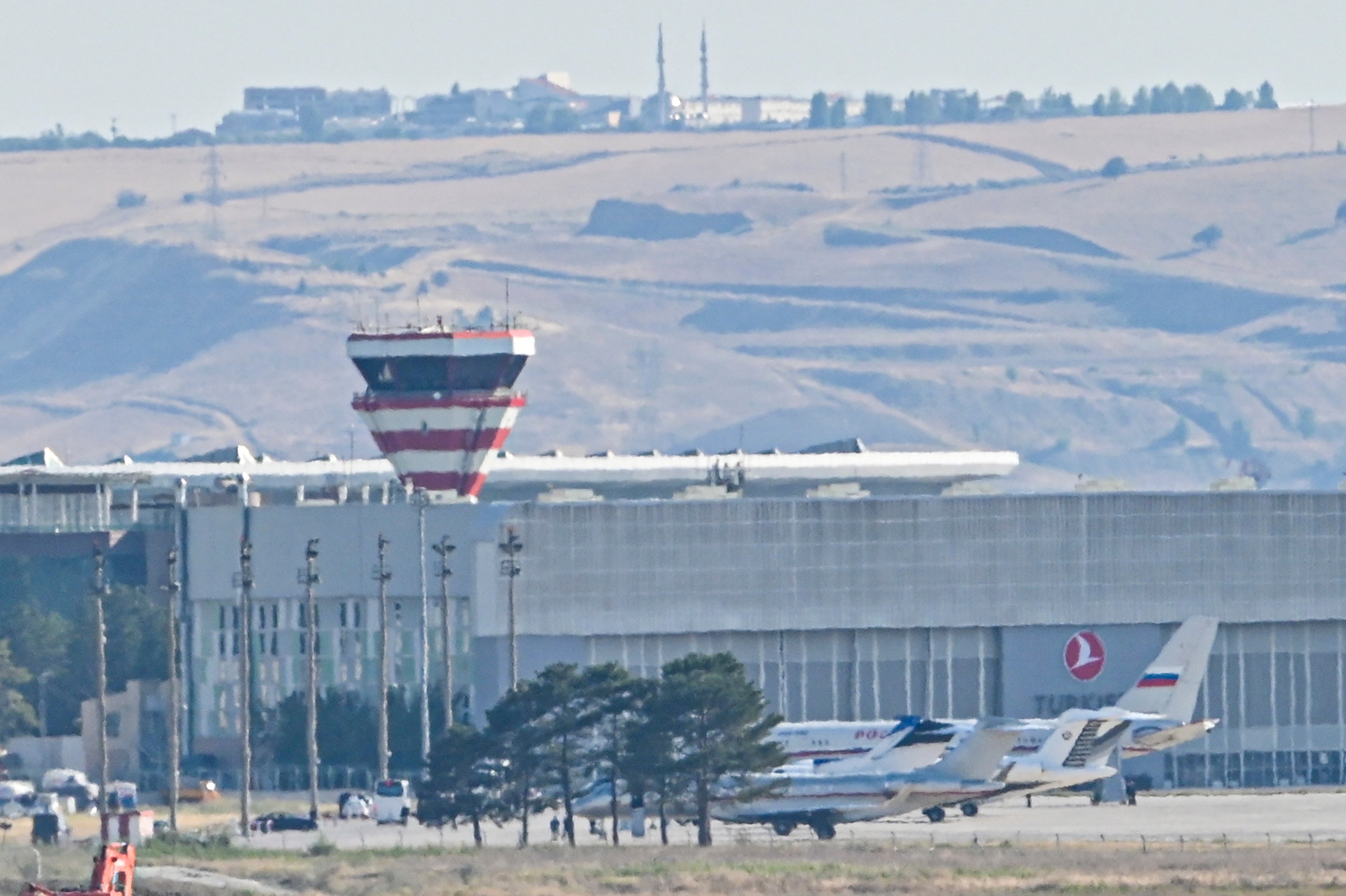 Planes believed to be carrying prisoners coming from Russia upon their arrival at the Ankara Airport