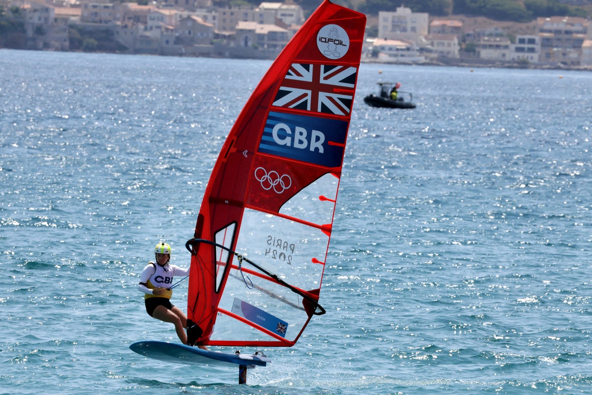Windsurfer Emma Wilson guaranteed a medal for Great Britain after weather delays