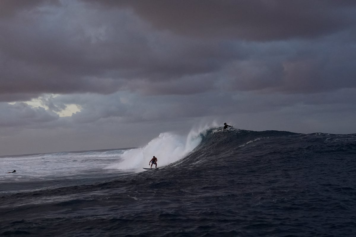 Judge removed from Olympics surfing panel after photo with athlete circulates on social media