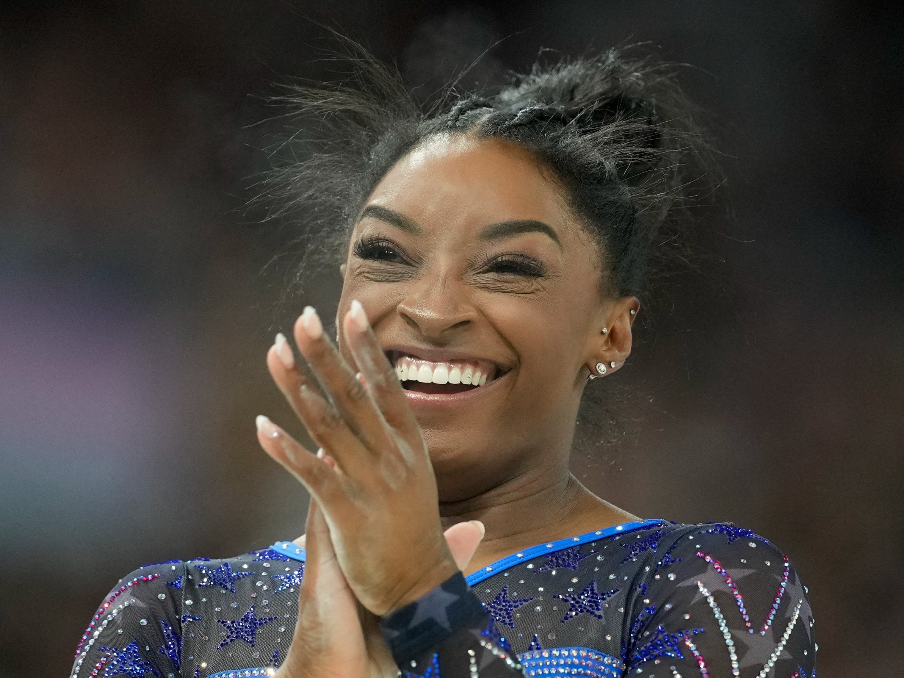 Simone Biles, of the United States, celebrates at Paris 2024