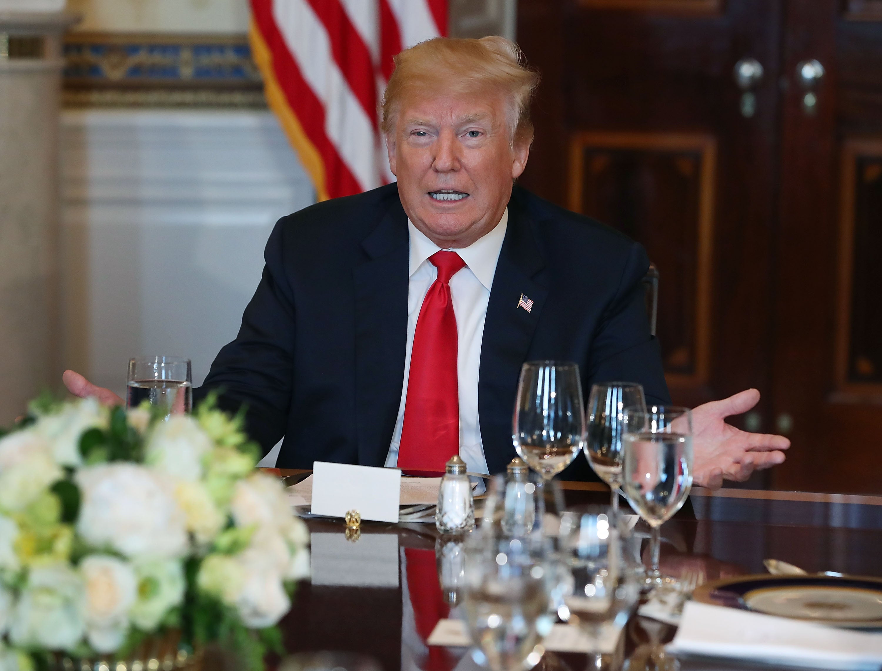 U.S. President Donald Trump speaks about immigration laws during a dinner with former and present governors in the Blue Room at the White House on May 21, 2017 in Washington, DC