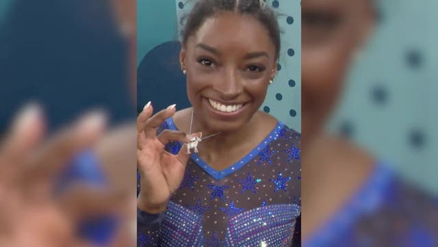 <p>Simone Biles reveals iconic necklace after historic gold medal at 2024 Olympics.</p>