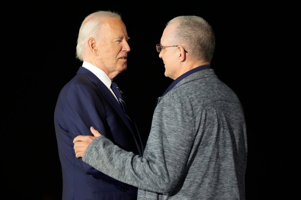 Evan Gershkovich and fellow freed Americans welcomed back to US by Biden and Harris after Russia prisoner swap