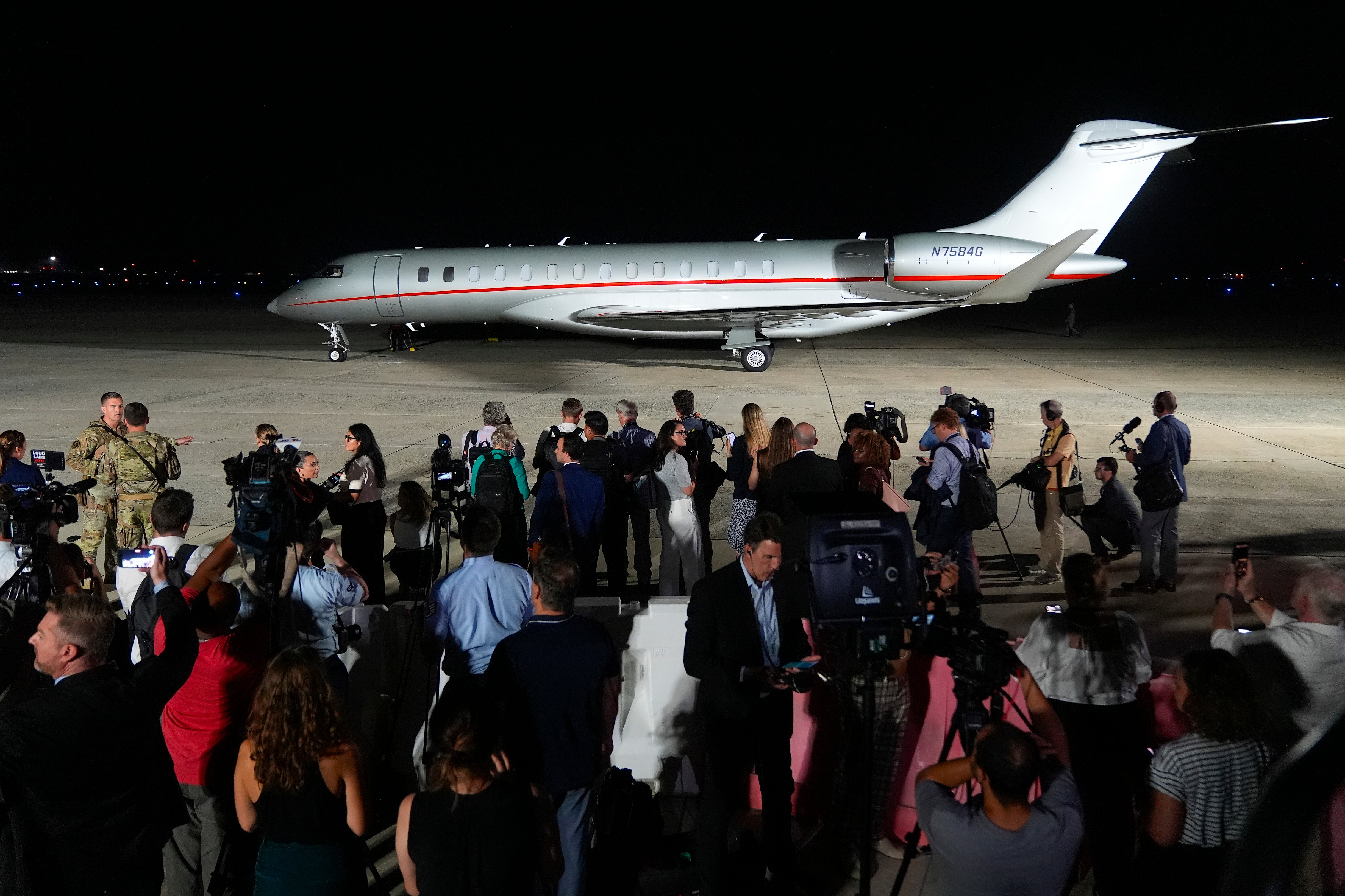 A plane carrying reporter Evan Gershkovich, Alsu Kurmasheva and Paul Whelan arrives at Andrews Air Force Base