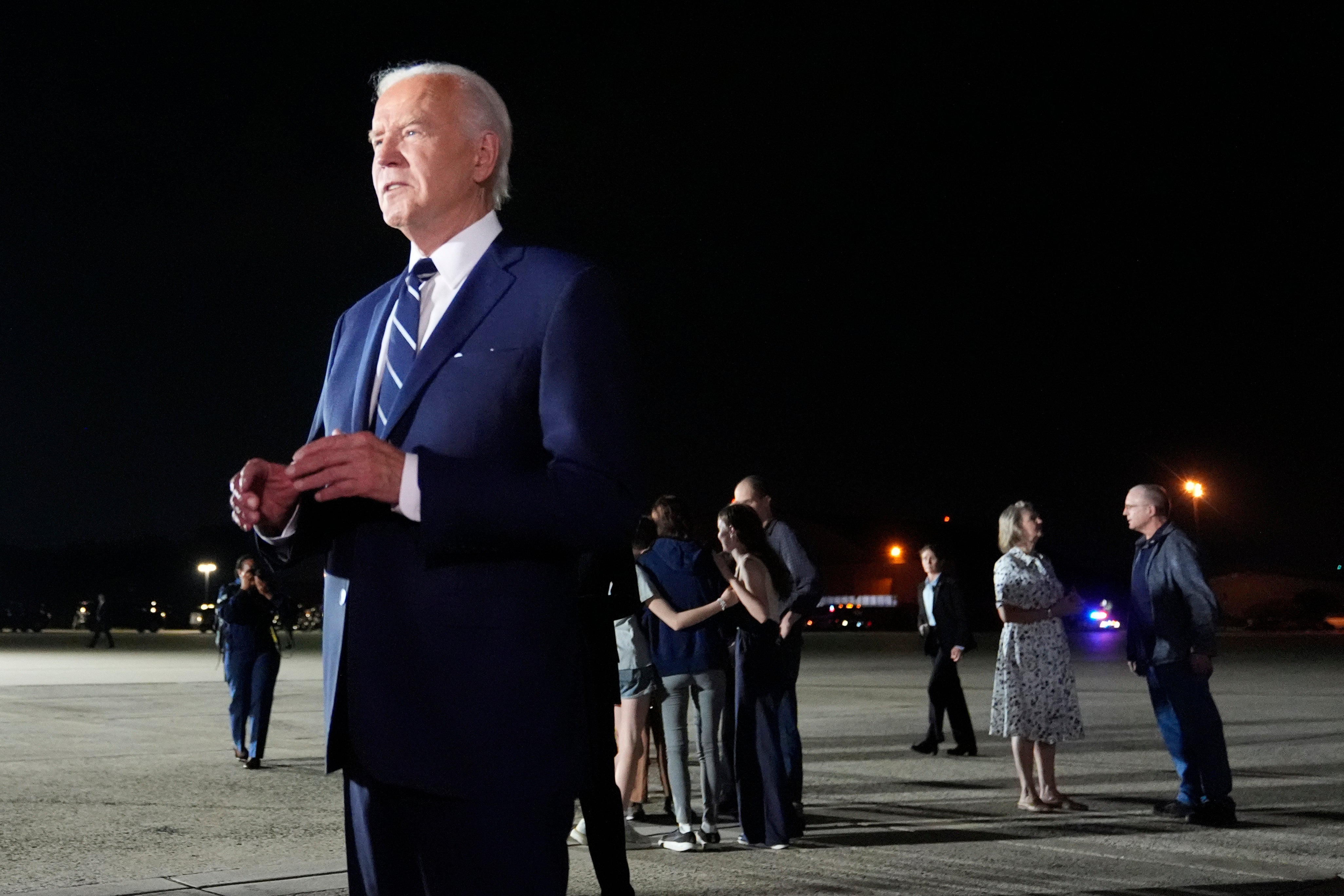 President Joe Biden speaks after greeting reporter Evan Gershkovich, Alsu Kurmasheva and Paul Whelan at Andrews Air Force Base