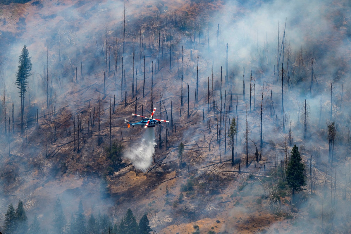 Increasing wind and heat plus risk of thunderstorms expected in fight against California wildfire