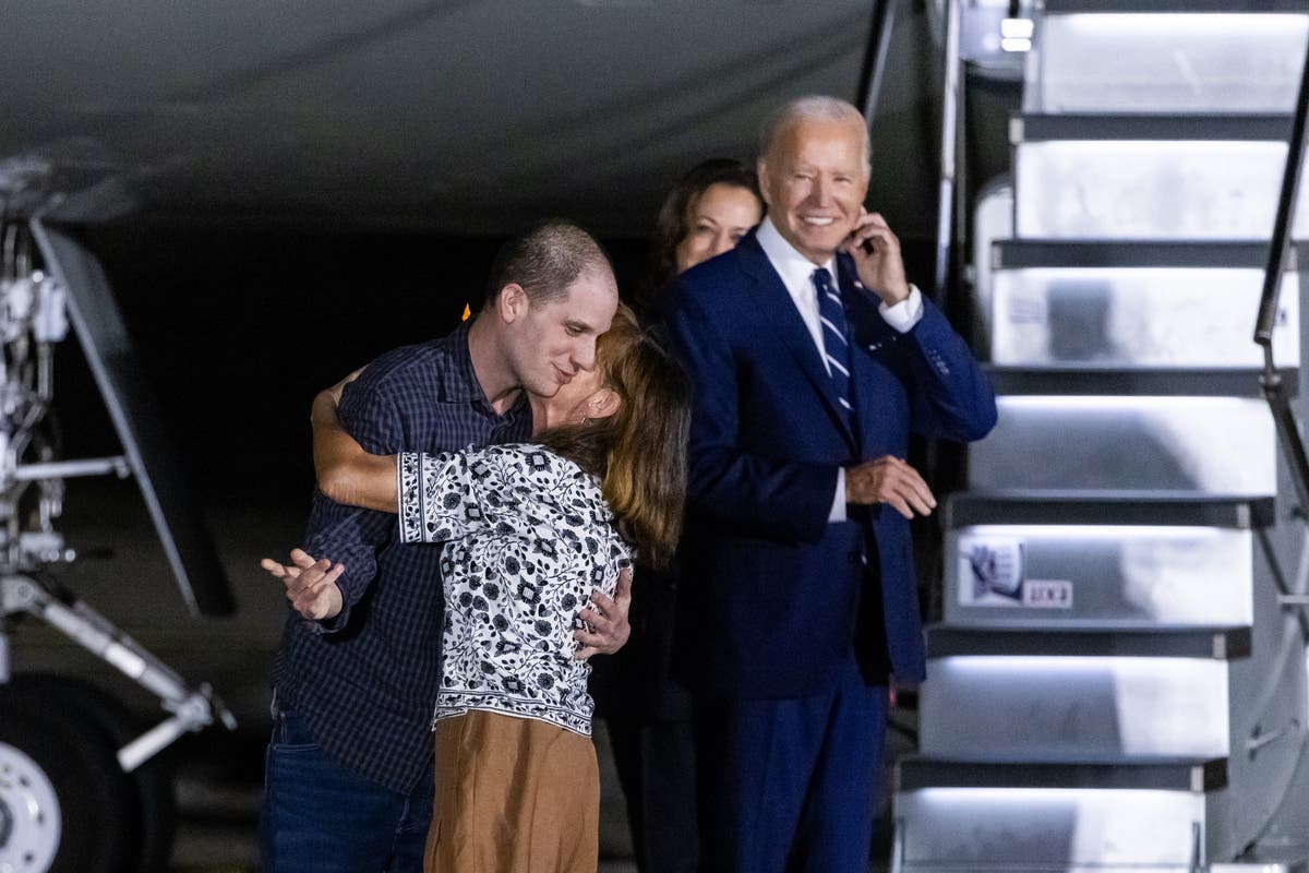 Harris and Biden greet prisoners released from Russia as Trump trashes swap deal