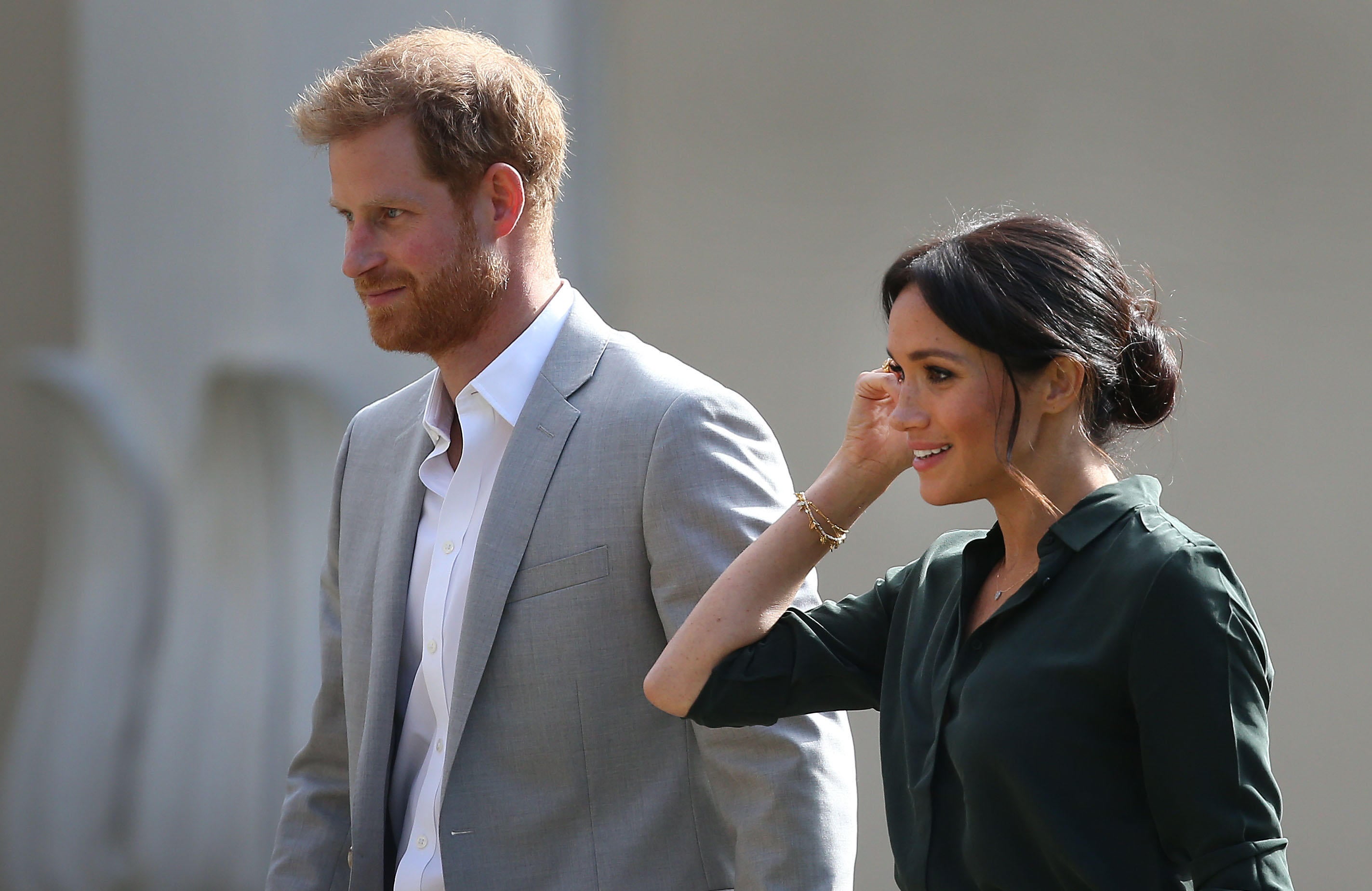 The Duchess of Sussex often opted for a messy, curly bun for public appearances (Alamy/PA)