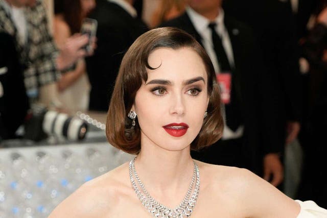 Lily Collins is a trailblazer for mastering French hair (Alamy/PA)