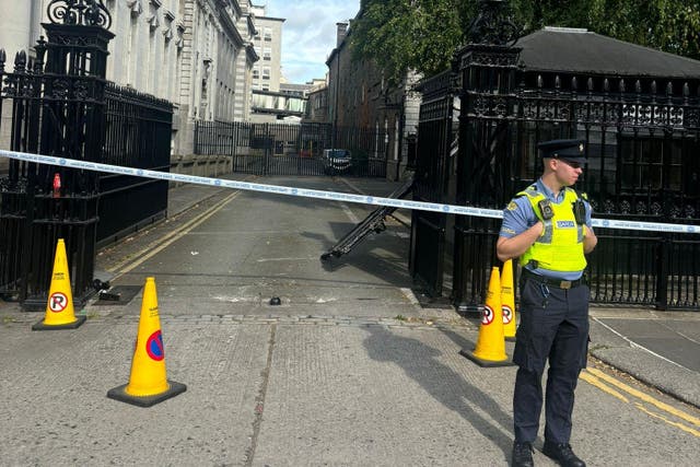 A van drove into several gates at Government Buildings in Dublin (Cate McCurry/PA)