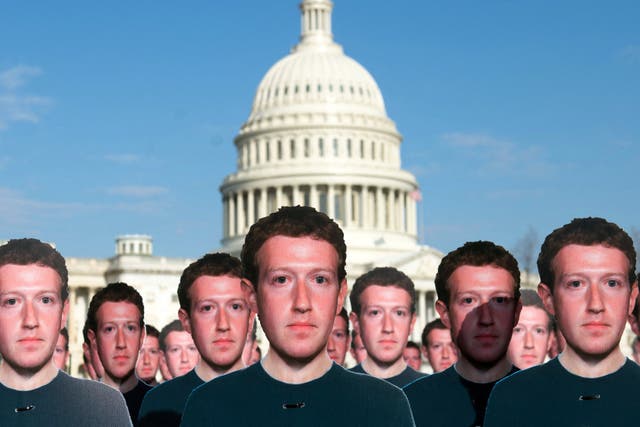 <p>Cardboard cutouts of Facebook founder and CEO Mark Zuckerberg outside the US Capitol in Washington, DC, 10 April, 2018</p>