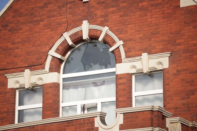 Cracked windows on the Southport Islamic Society Mosque in Southport following protests earlier this week (James Speakman/PA)