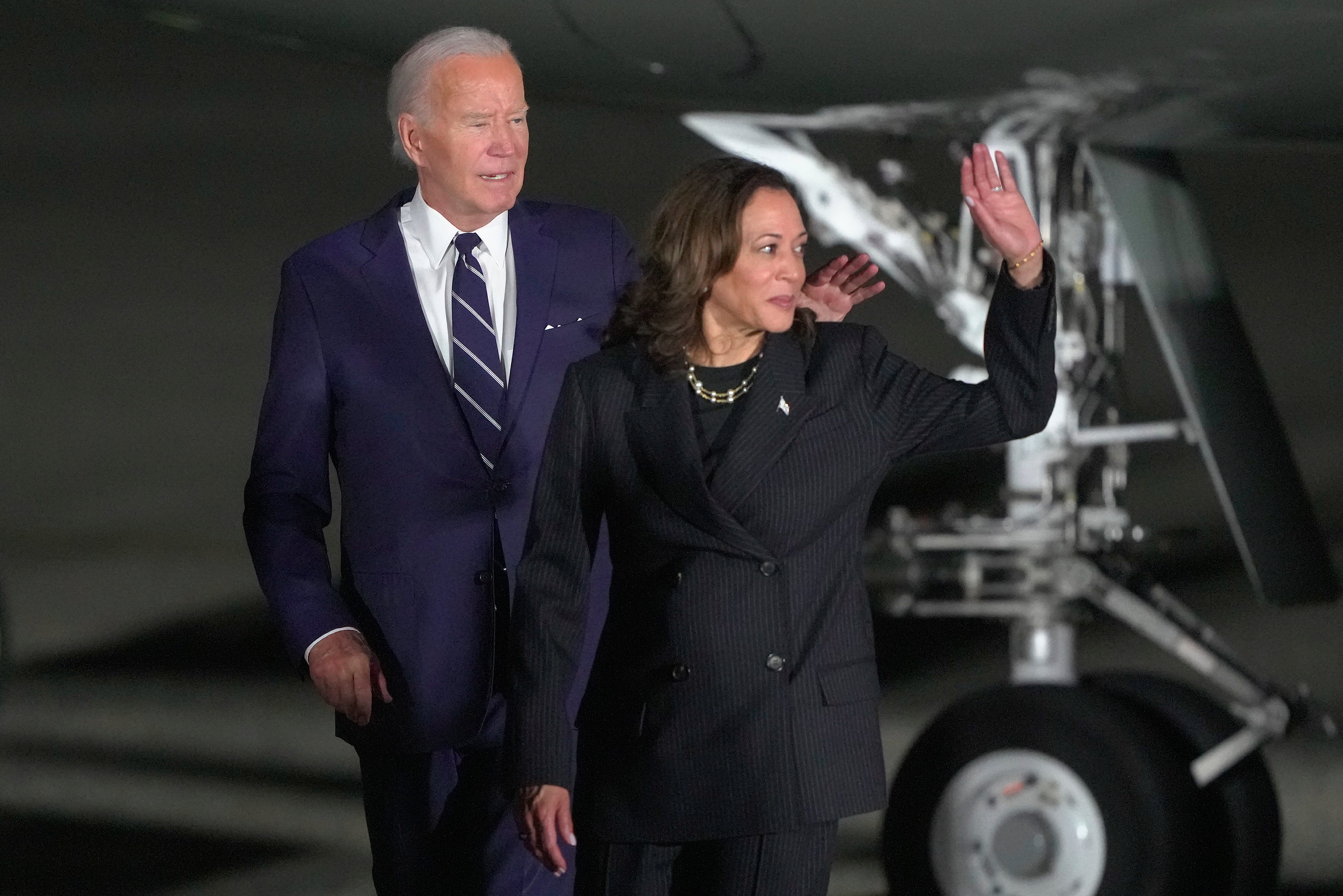 President Joe Biden and Vice President Kamala Harris walking across the tarmac after greeting reporter Evan Gershkovich, Alsu Kurmasheva and Paul Whelan at Andrews Air Force Base, Md., following their release as part of a 24-person prisoner swap between Russia and the United States, Friday, Aug. 2, 2024.