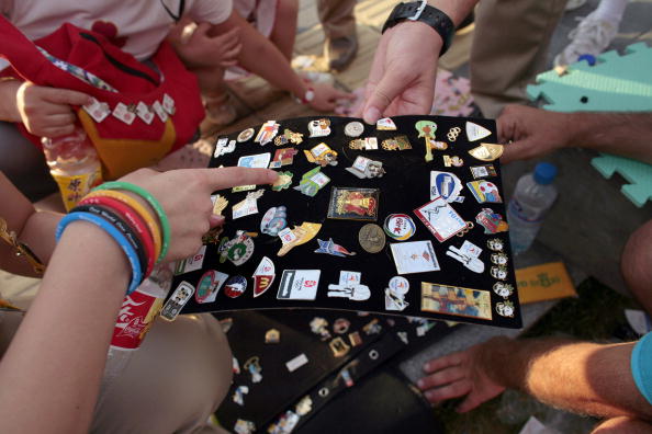 Exchanging Olympic pins is a common tradition among athletes.