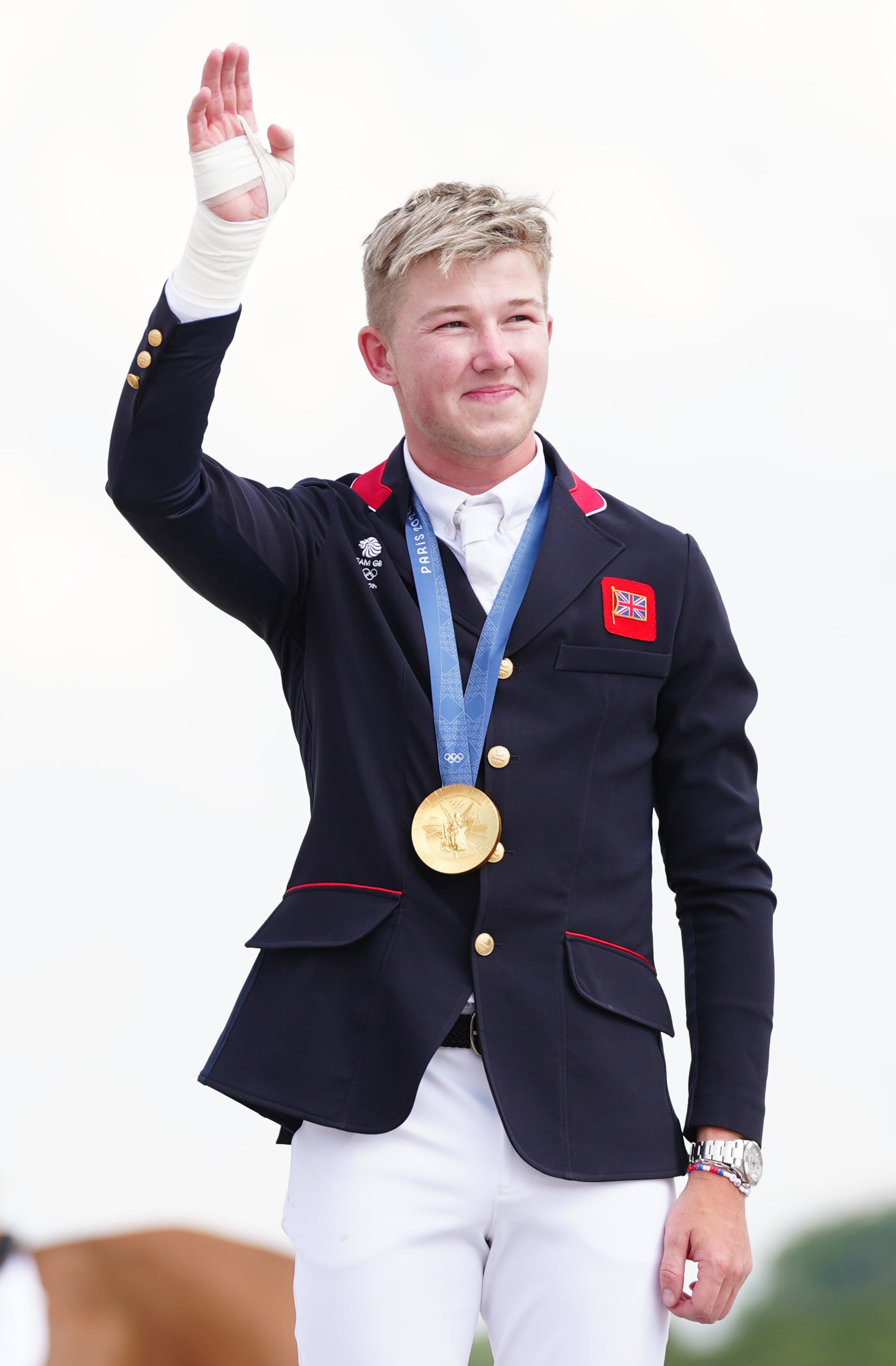 Like father, like son – Harry Charles celebrates with his gold medal in 2024 (David Davies, PA)