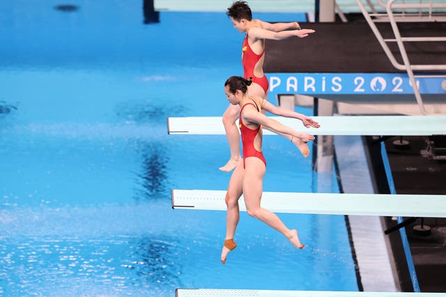 <p>Chinese athletes during the women’s synchronised 3m springboard diving final at the Paris Olympics on 27 July</p>