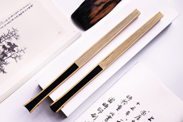 <p>A pair of fans made by Xu Jiadong</p>