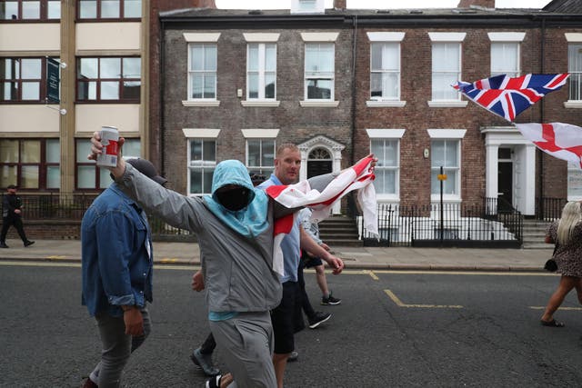 <p>People protest in Sunderland city centre on Friday, following the stabbing attacks in Southport on Monday, in which three young children were killed</p>