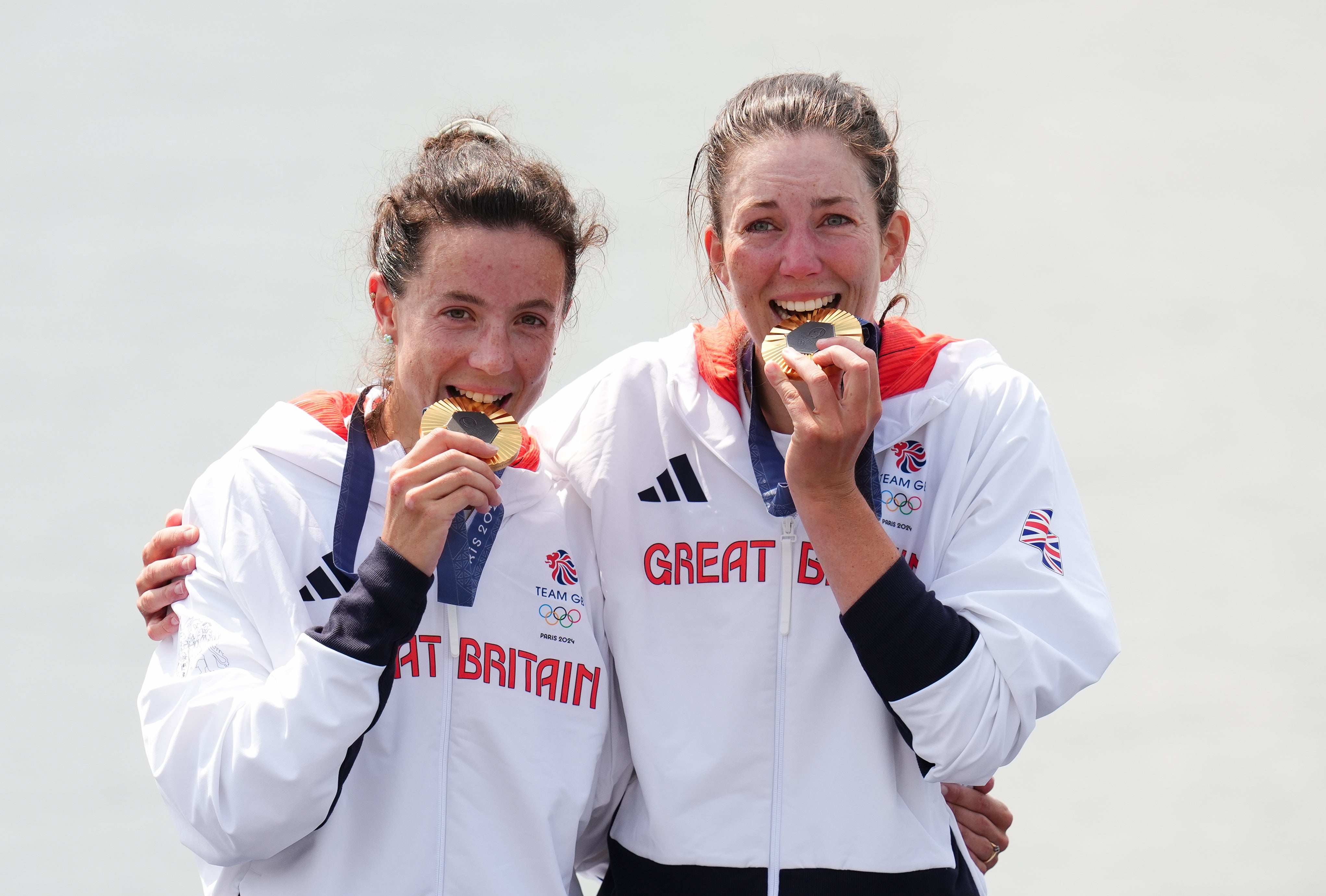 Emily Craig and Imogen Grant celebrate with their gold medals