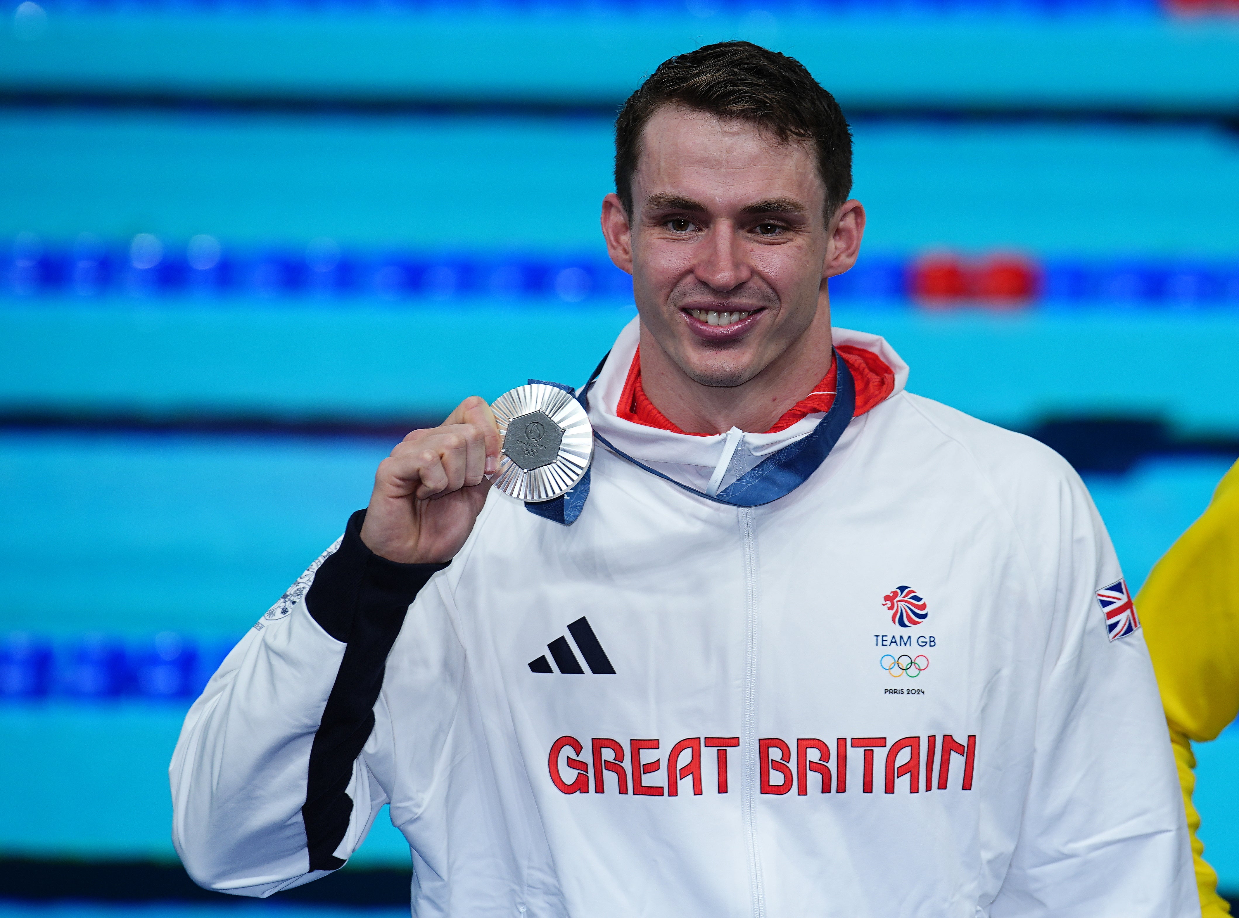 Ben Proud with his silver medal (Peter Byrne/PA)