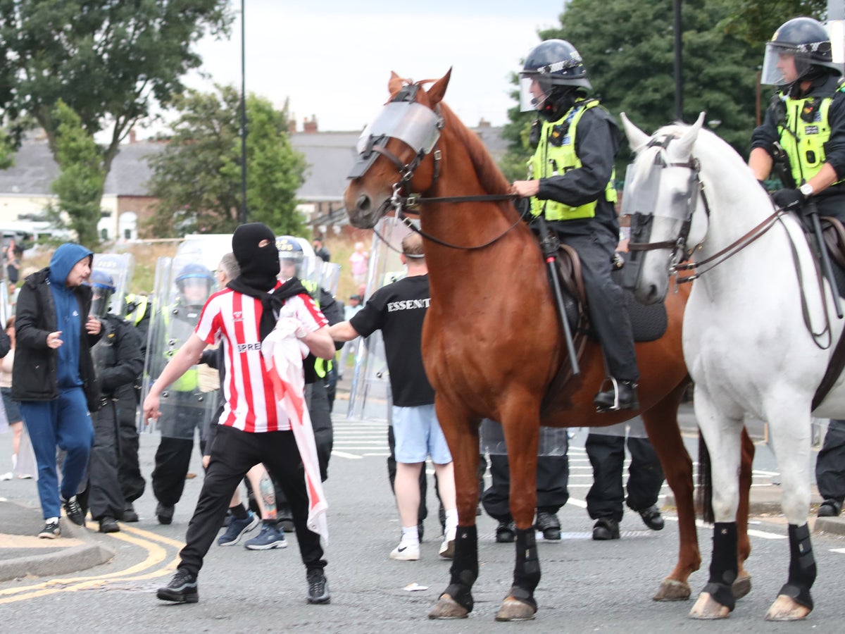 Disorder in Sunderland as hundreds of rioters draped in England flags gather