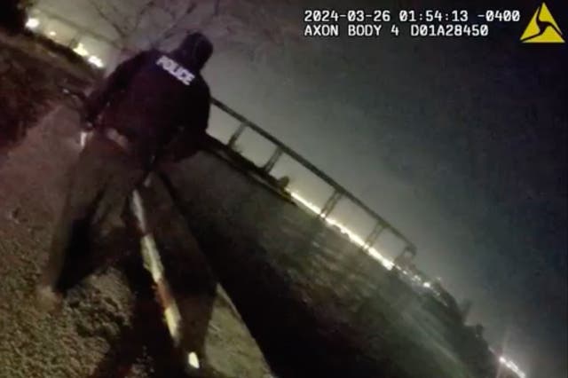 <p>Body cam footage shared by the Baltimore Police Department shows officer reactions in the aftermath of the collapse of the Francis Scott Key Bridge</p>