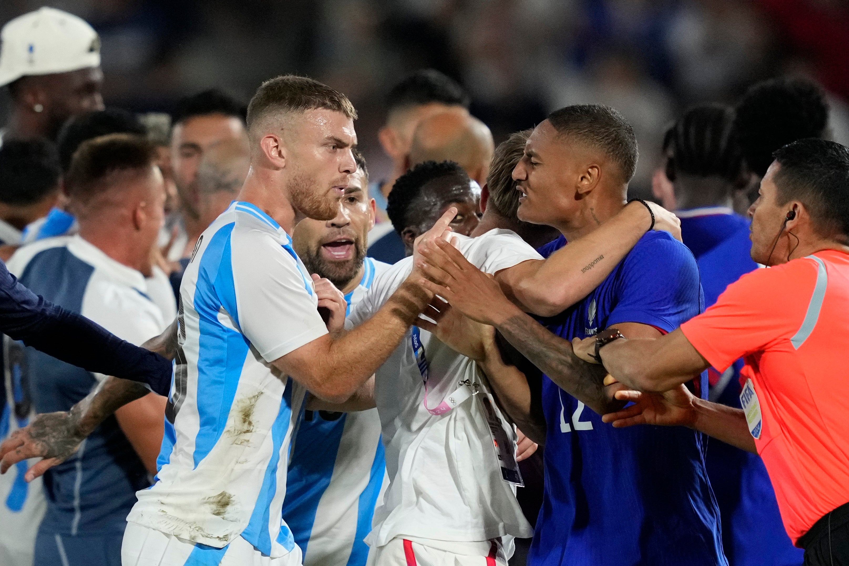 France and Argentina players confront one another at the end of the match in Bordeaux (Moises Castillo/AP).