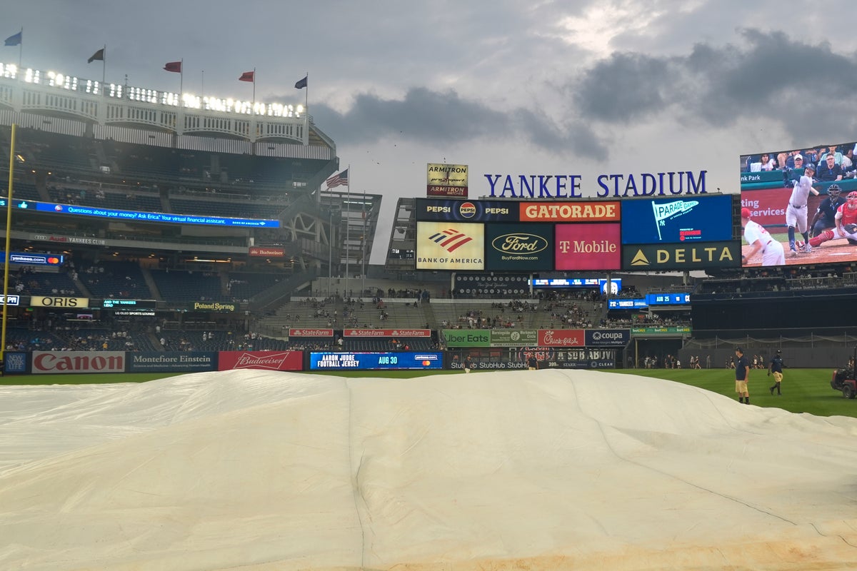 Some Yankee Stadium bleachers fans chant `U-S-A!' during `O Canada' before game against Blue Jays