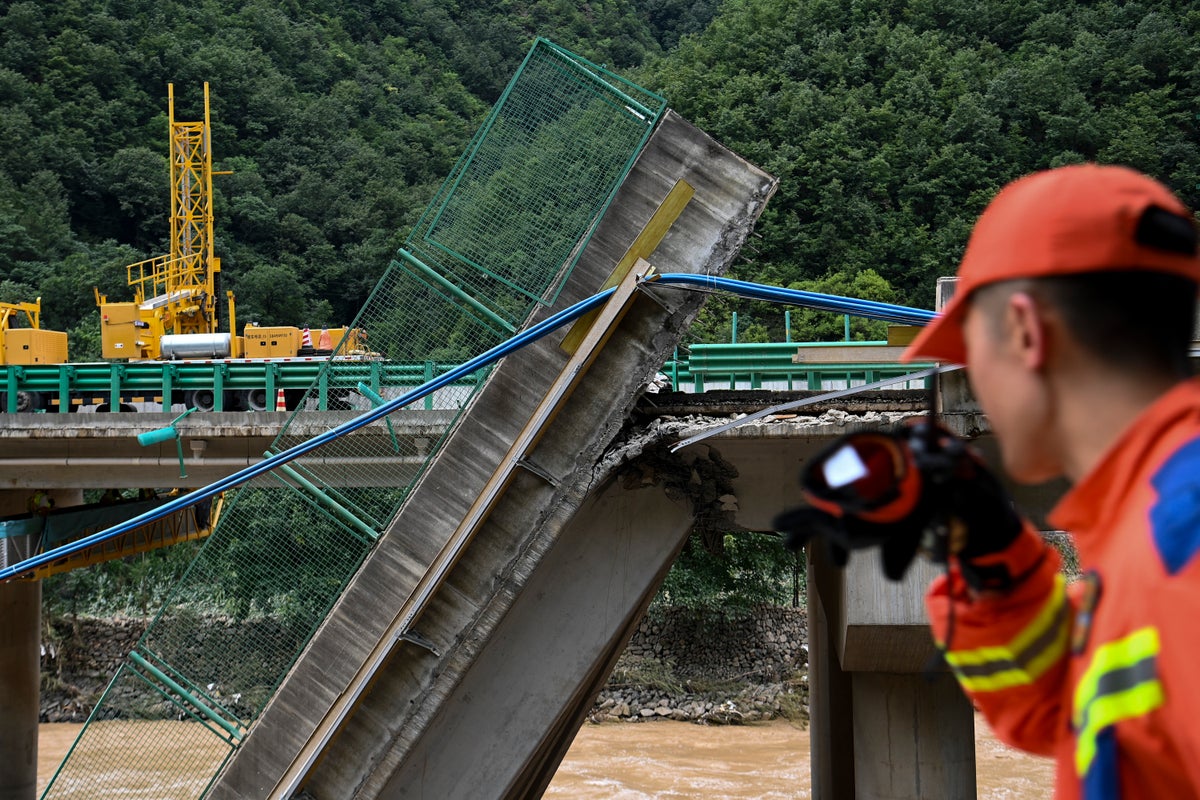 Death toll from bridge collapse in China rises to 38 as two dozen still missing