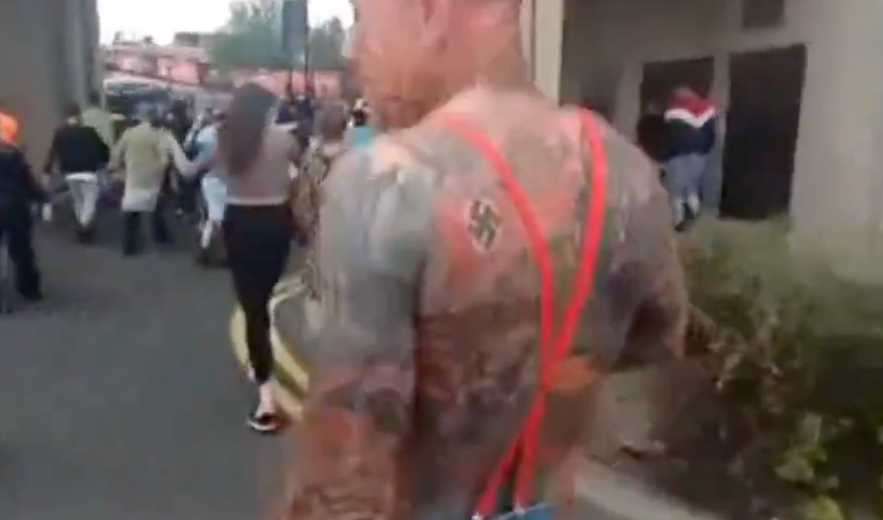 The man with a Swastika tattoo was seen in crowds in Sunderland