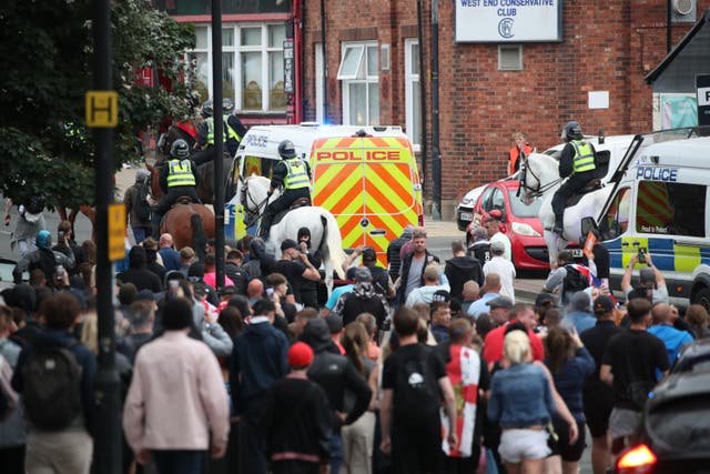 <p>Violent scenes in Sunderland on Friday resulted in four offices being injured (Scott Heppell/PA)</p>