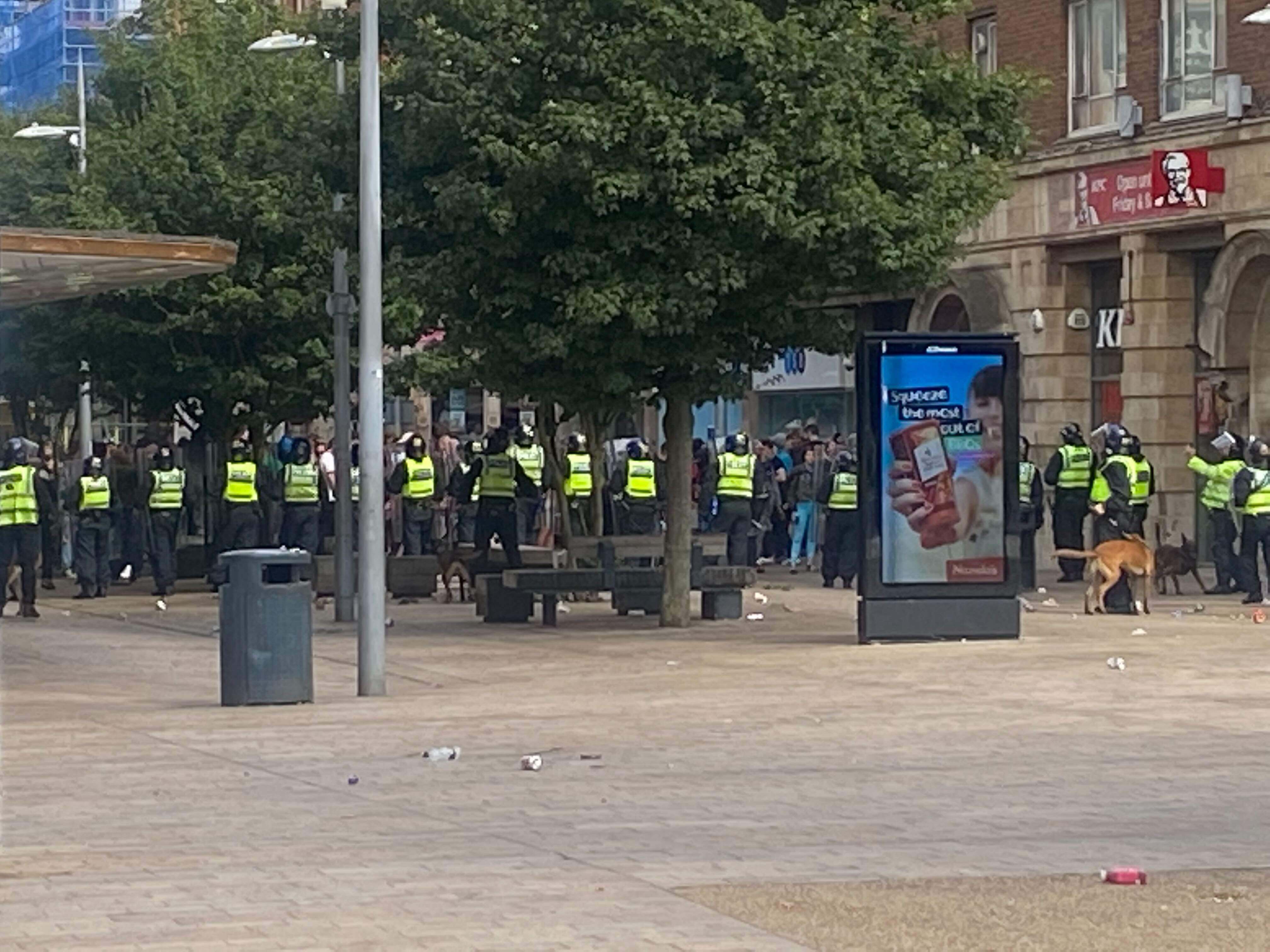 Police and protesters stand off