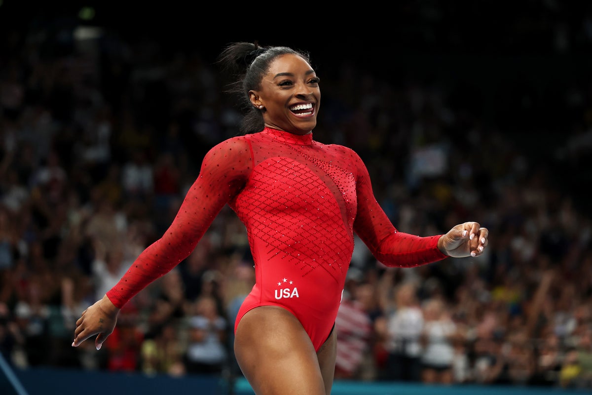 Simone Biles lands signature skill to win third gold…