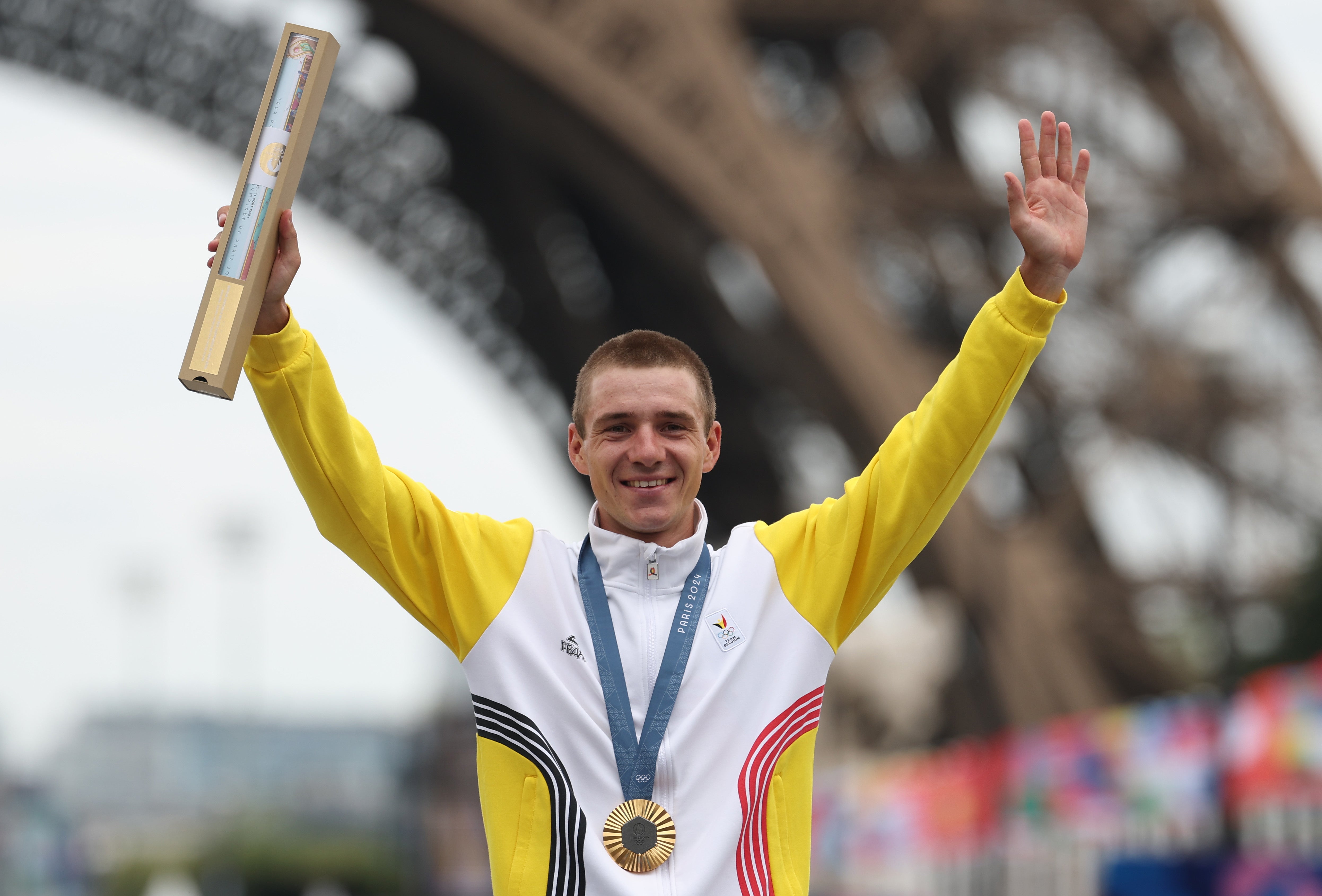 Evenepoel celebrates with his road race gold medal