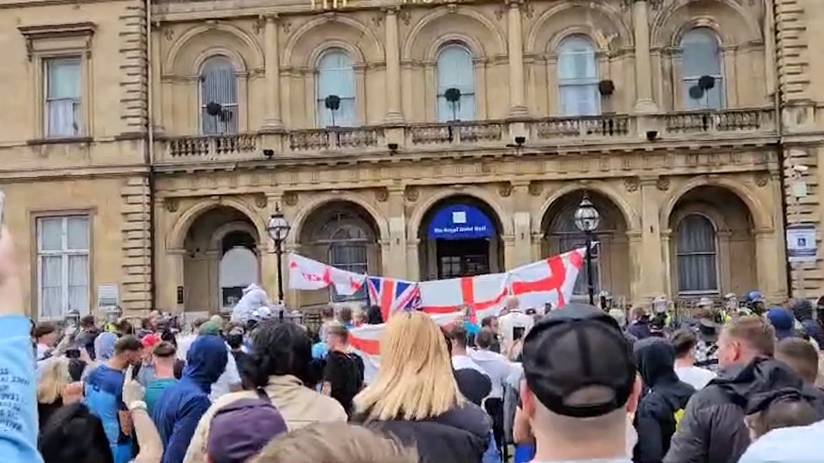 Far-right gather outside hotel housing asylum seekers in Hull