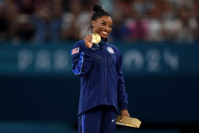 <p>Biles reclaimed her vault title to win a third gold medal at Paris </p>