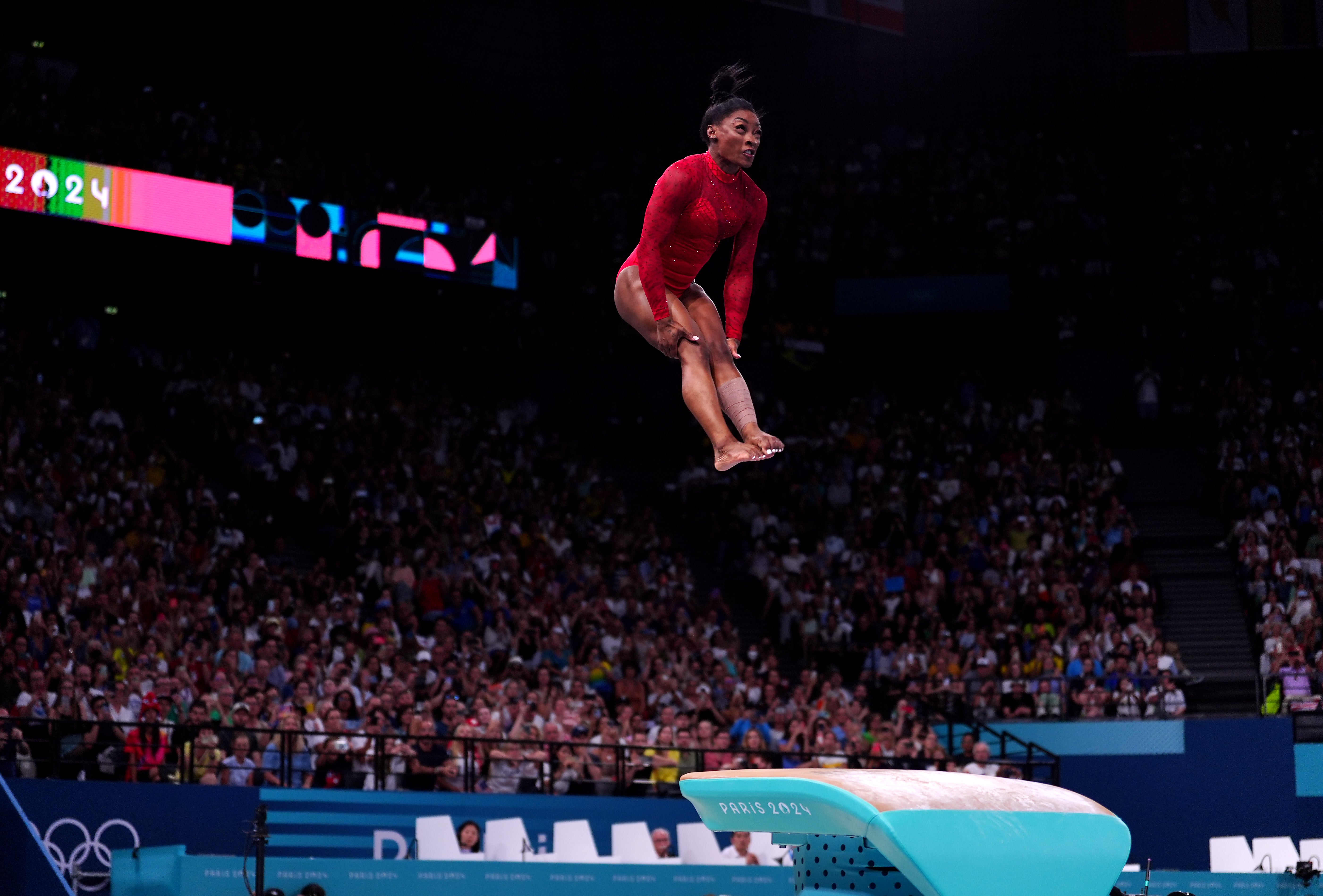 Simone Biles performs her signature jump on August 3, taking home her third gold medal at the Paris Olympics.