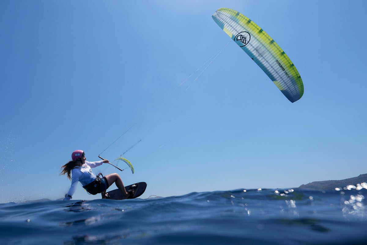 Over 40mph on water while balanced on a tea tray – welcome to kitesurfing
