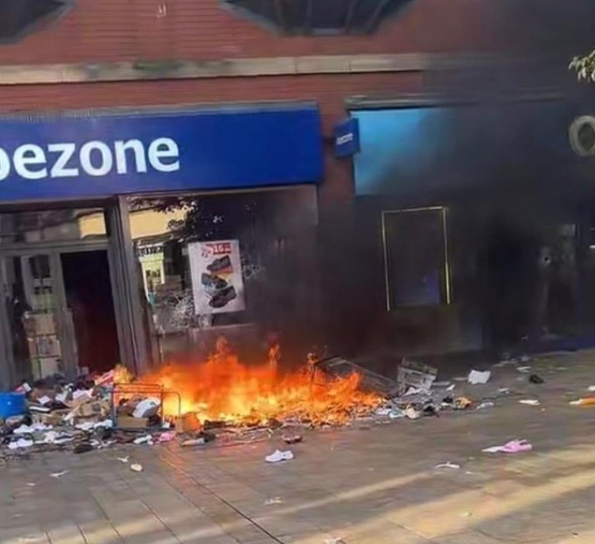 Shameless far-right rioters loot shops and set fire to library