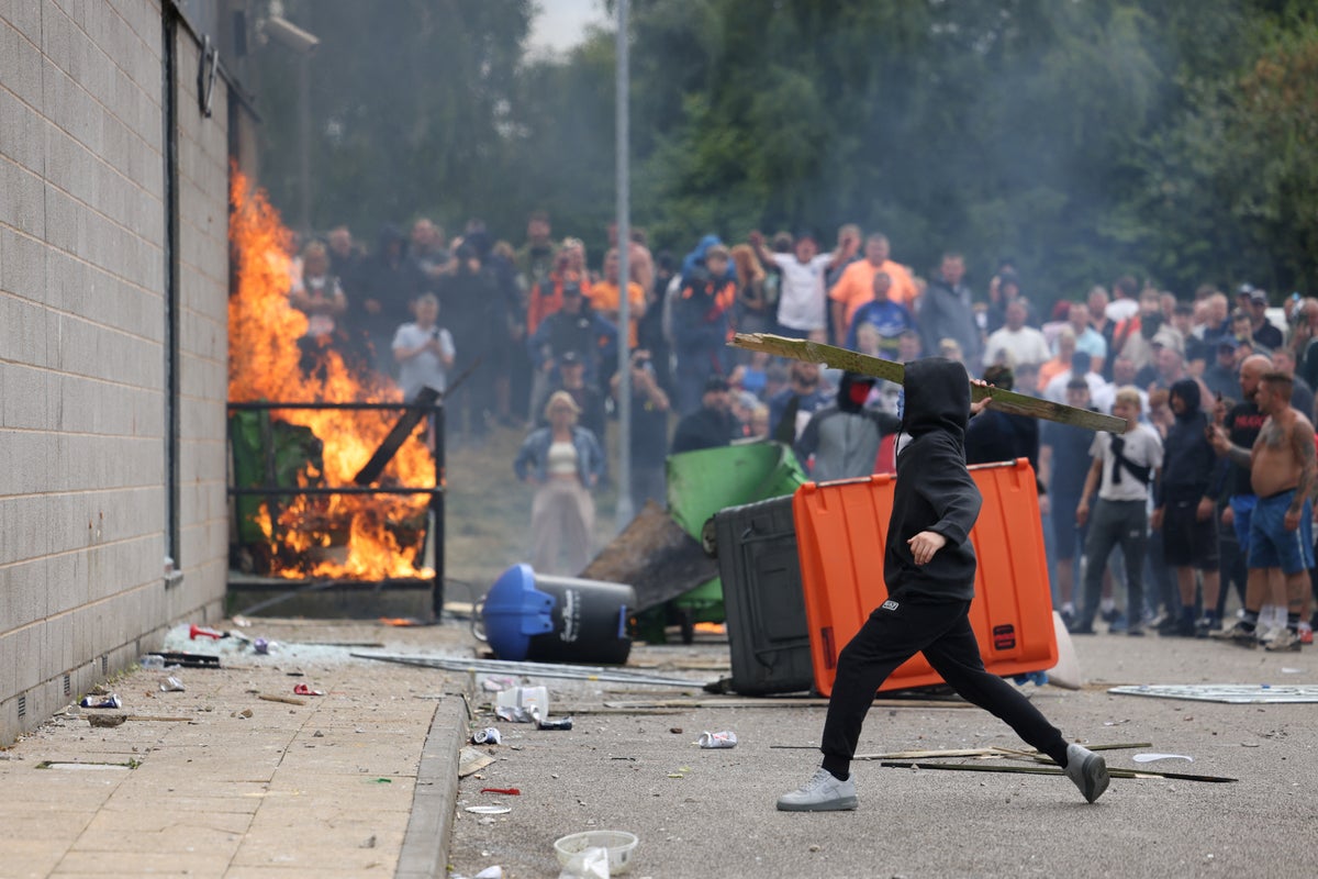 UK riots live: Far-right set fire to Rotherham Holiday Inn housing migrants as police clash with violent mob