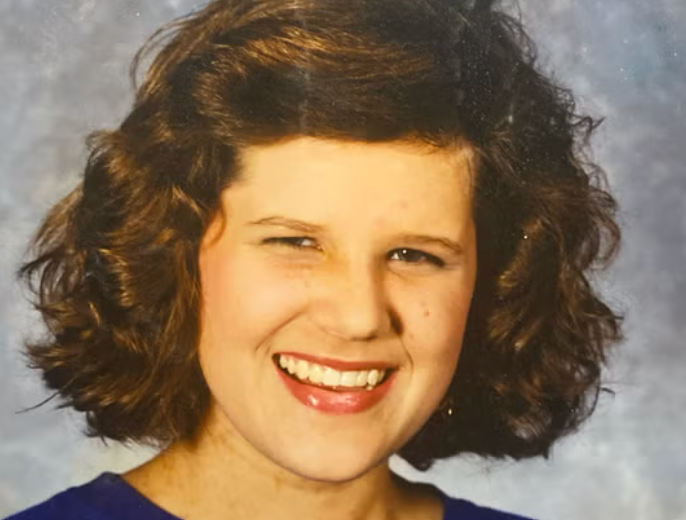 Jennifer Brown, who got married at the age of 16 in Mississippi, smiles in a 9th grade yearbook photo in September 1991 at the age of 15