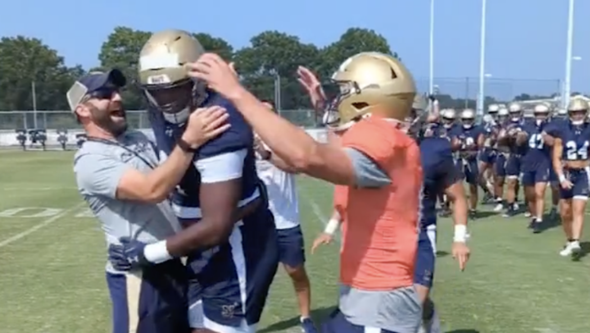 Navy football player finds out sister won Olympic gold while on pitch