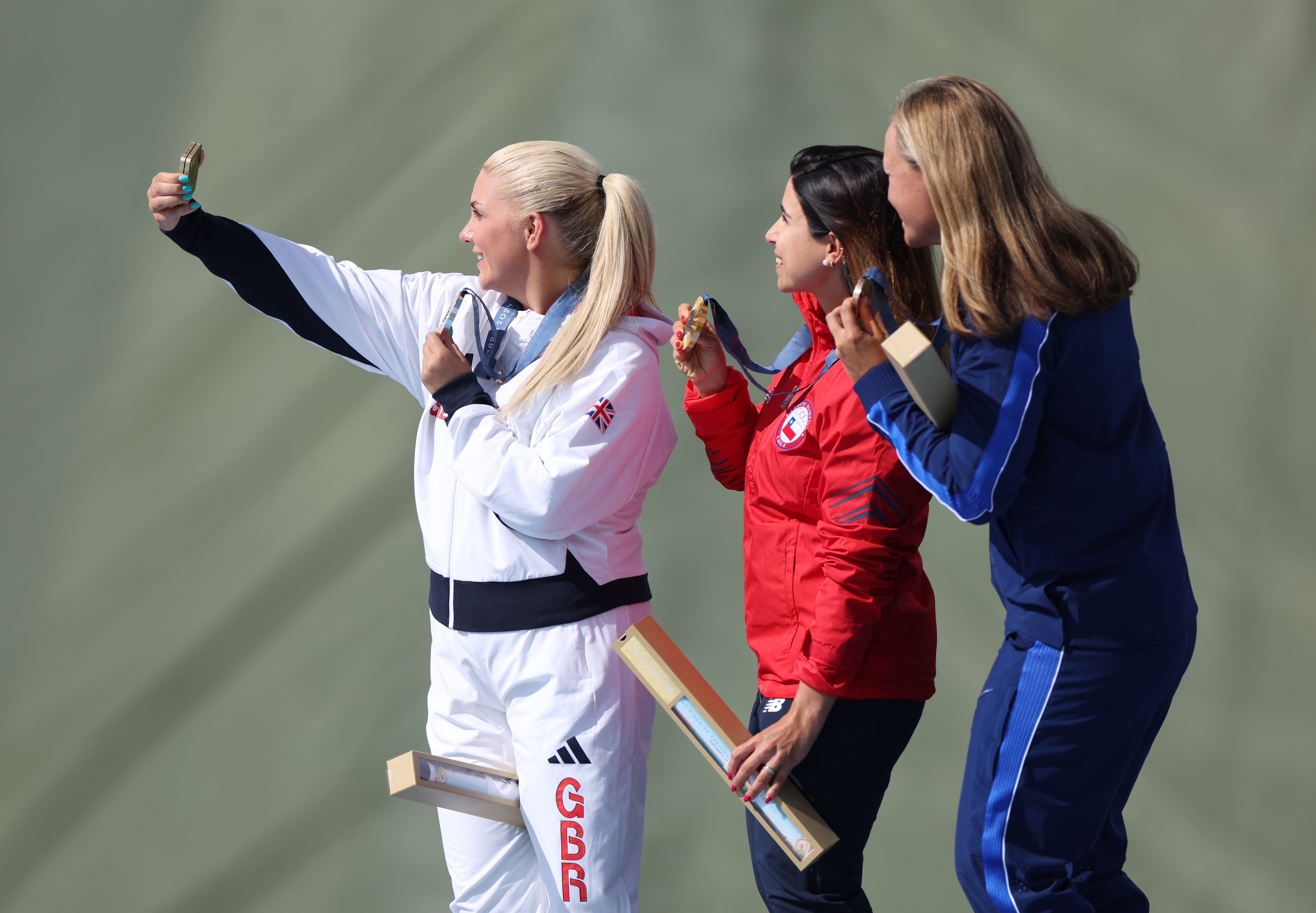 Amber Rutter (left) fulfilled a dream of climbing onto an Olympic podium (Isabel Infantes/PA)