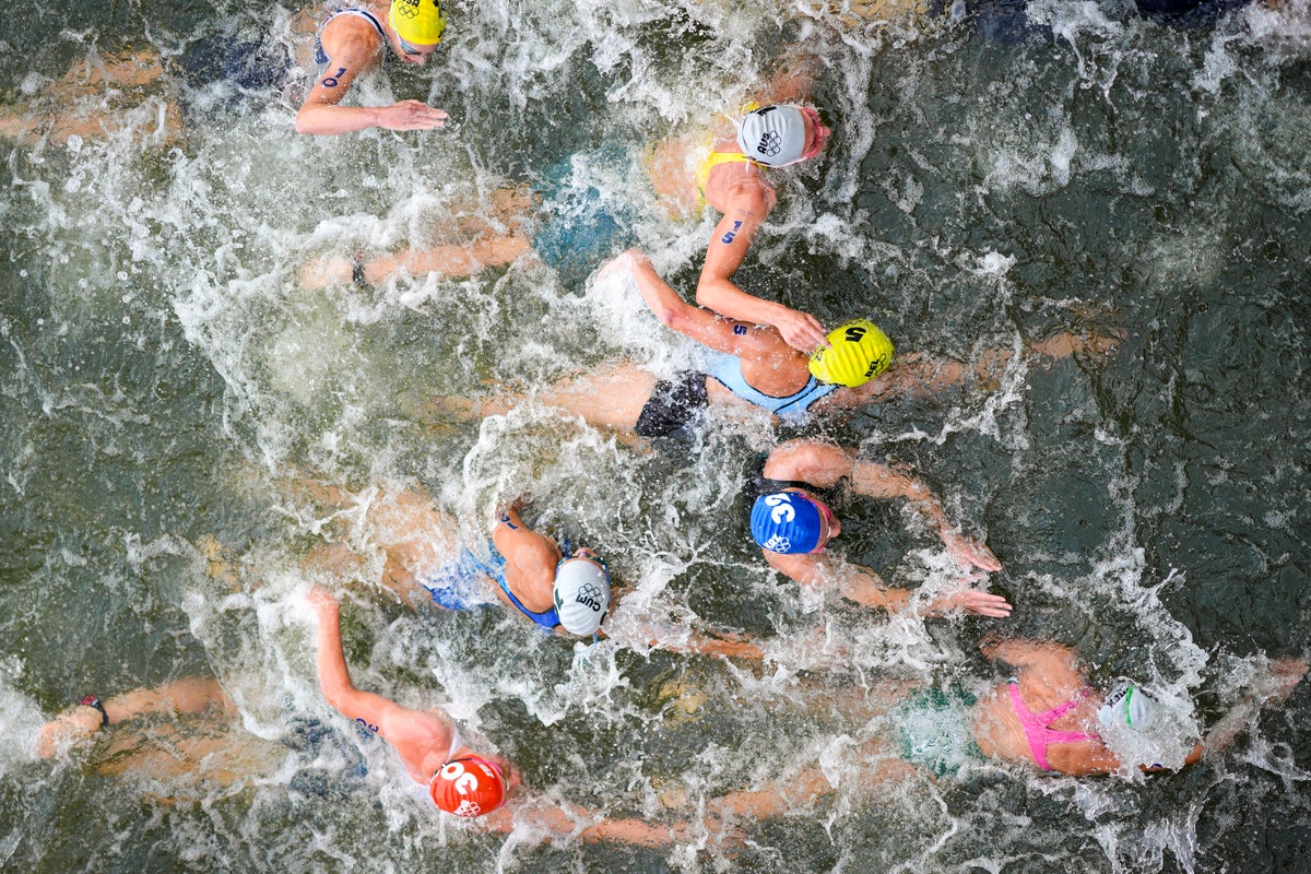 Belgium withdraws from mixed relay triathlon after athlete who swam in Seine River falls ill