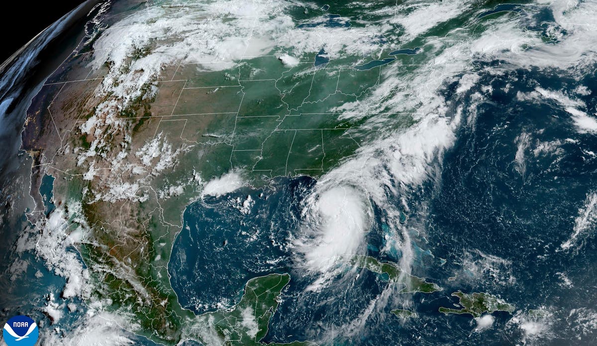 Debby intensifies into hurricane threatening 10ft storm surge and historic rain in US