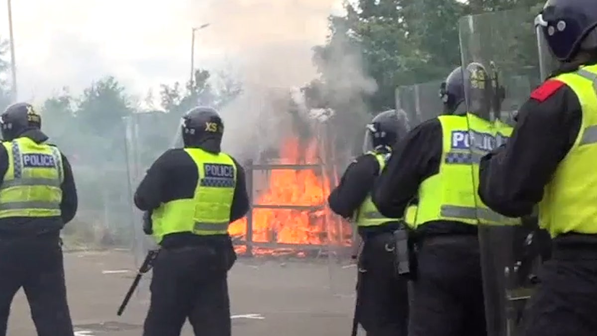 Fire breaks out and arrests made during violent clashes between far-right and police in Rotherham