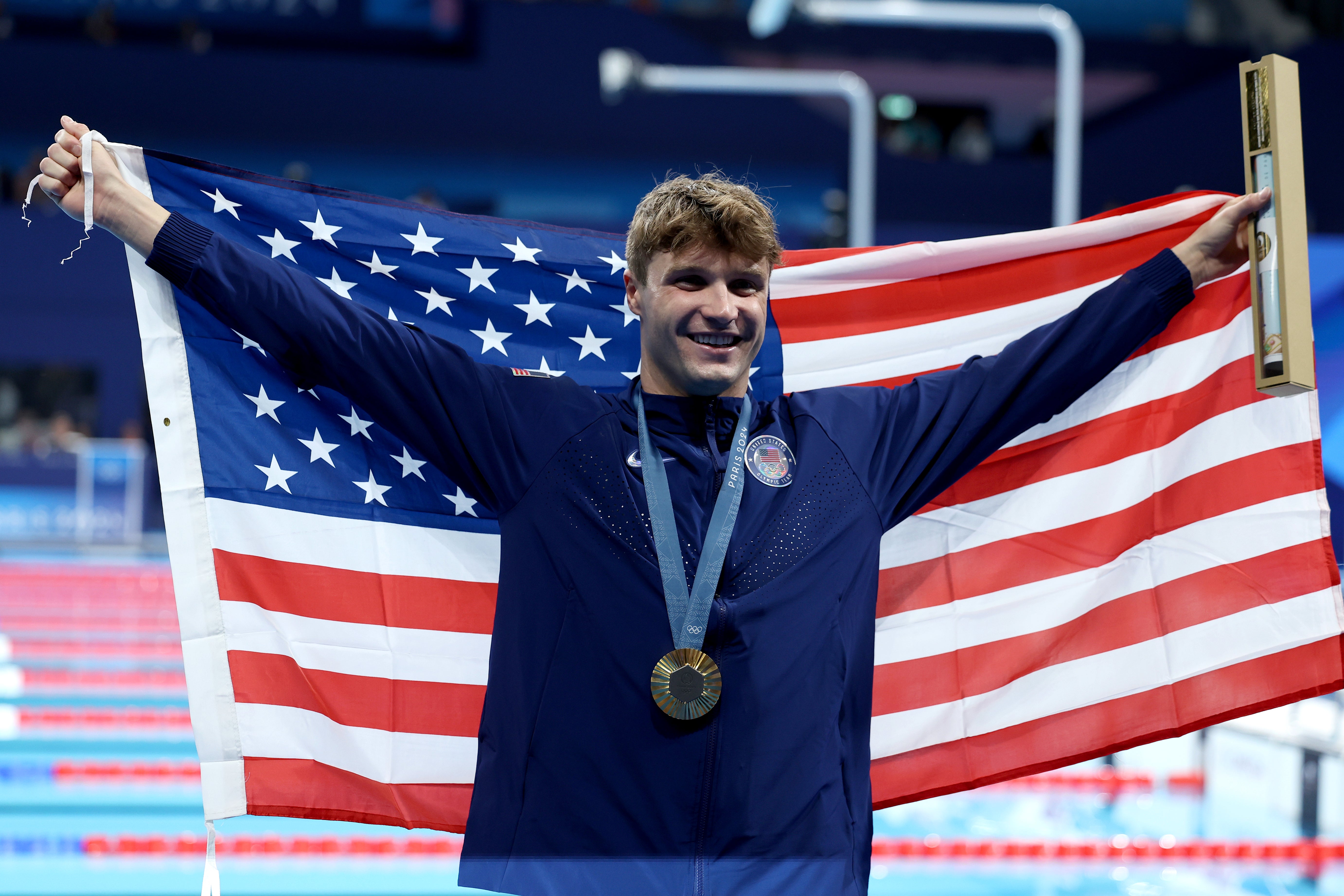 Bobby Finke, pictured, beat the world record and won gold in the men’s 1500-meter freestyle race on Sunday