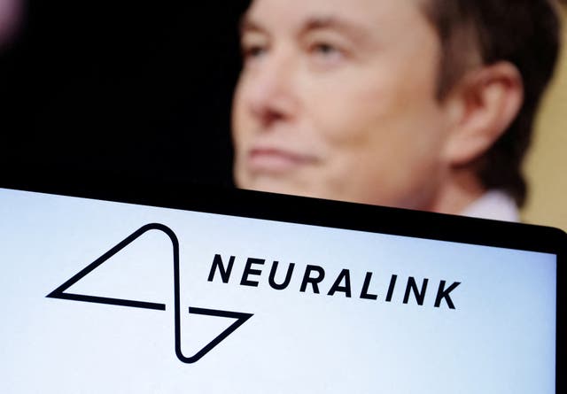 Neuralink logo and Elon Musk photo are seen in this illustration taken, December 19, 2022